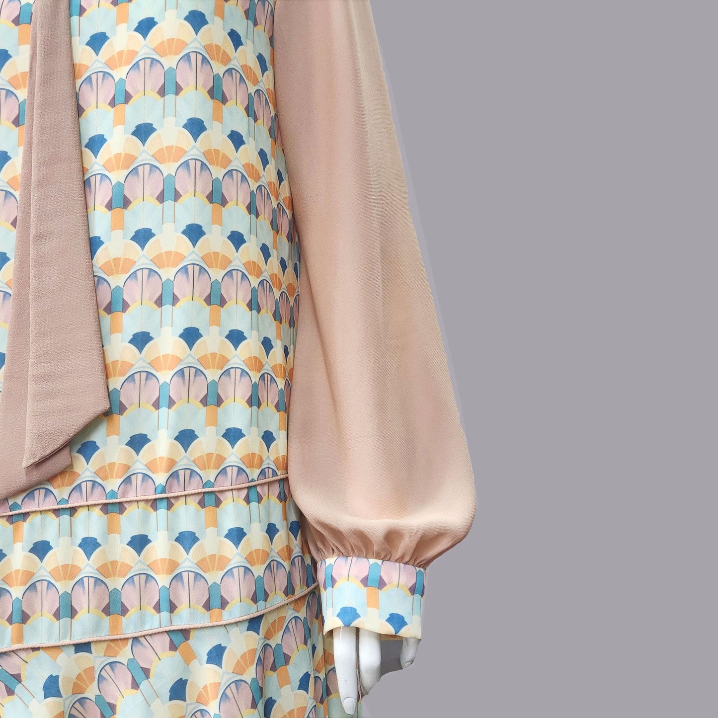 1920s dress with Playful Pastel Art Deco Print and brown Contrast
