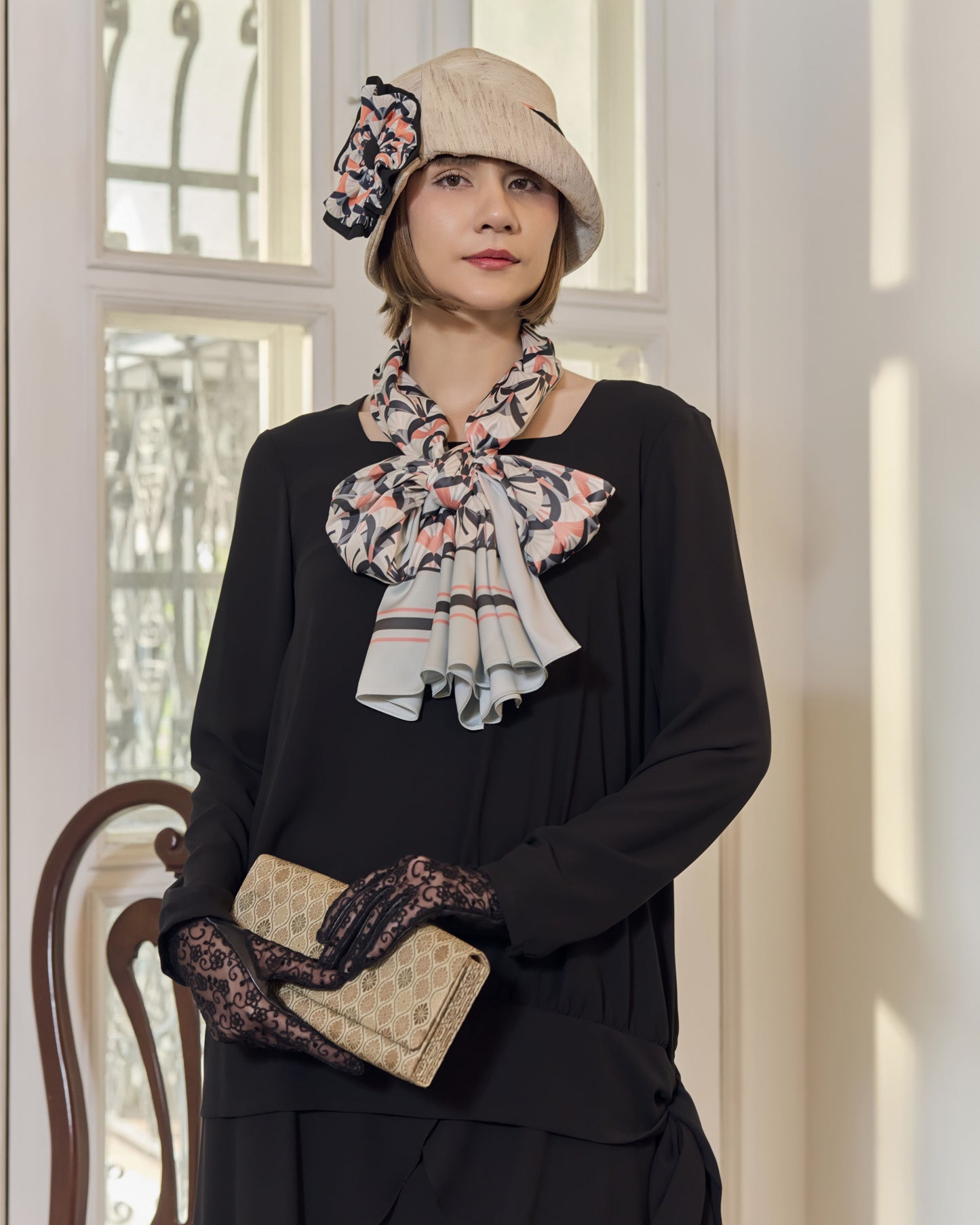 Cloche hat in cream color with art deco floral hat band