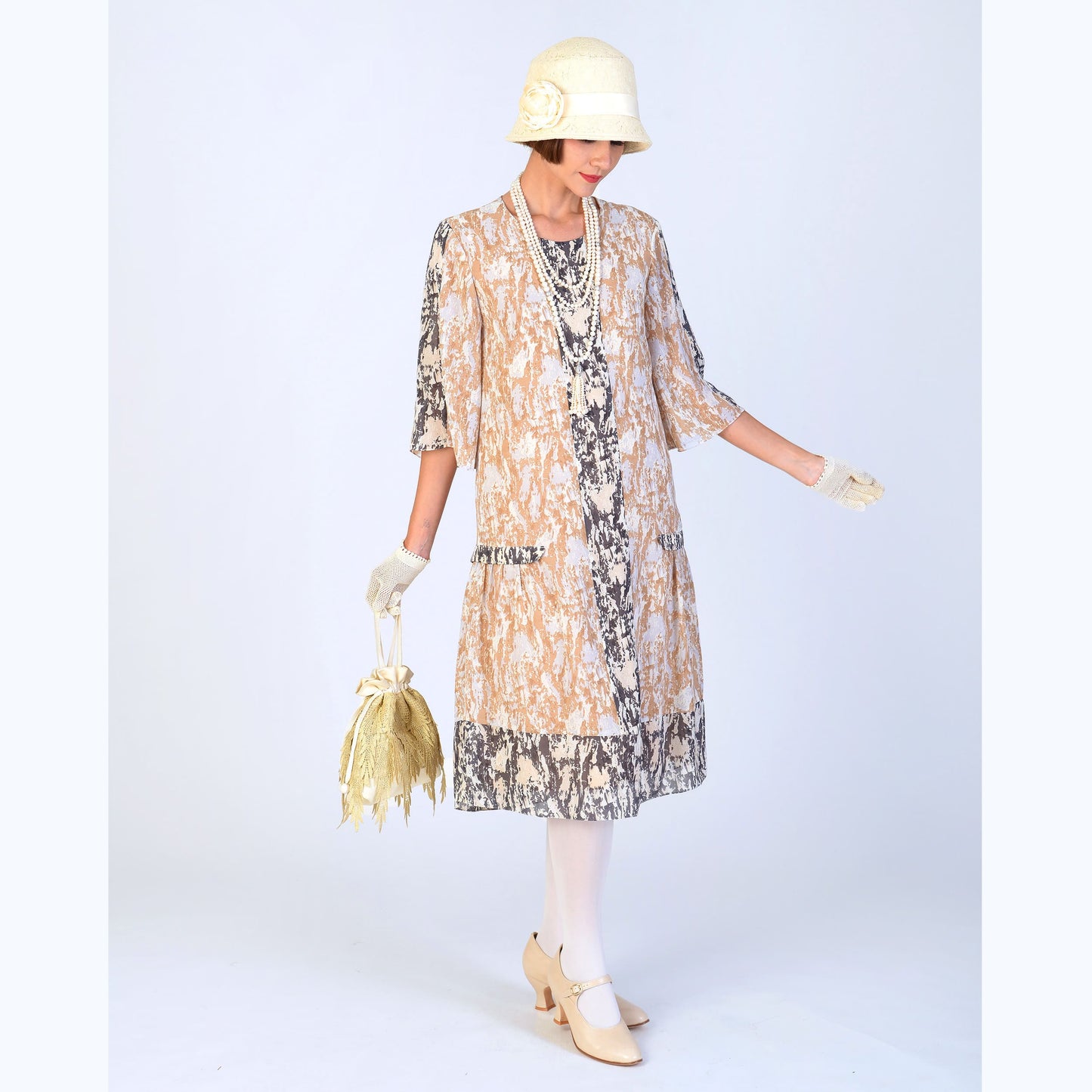 This roaring twenties dress in brown and black camouflage color can be worn as a Great Gatsby dress, flapper or Downton Abbey dress
