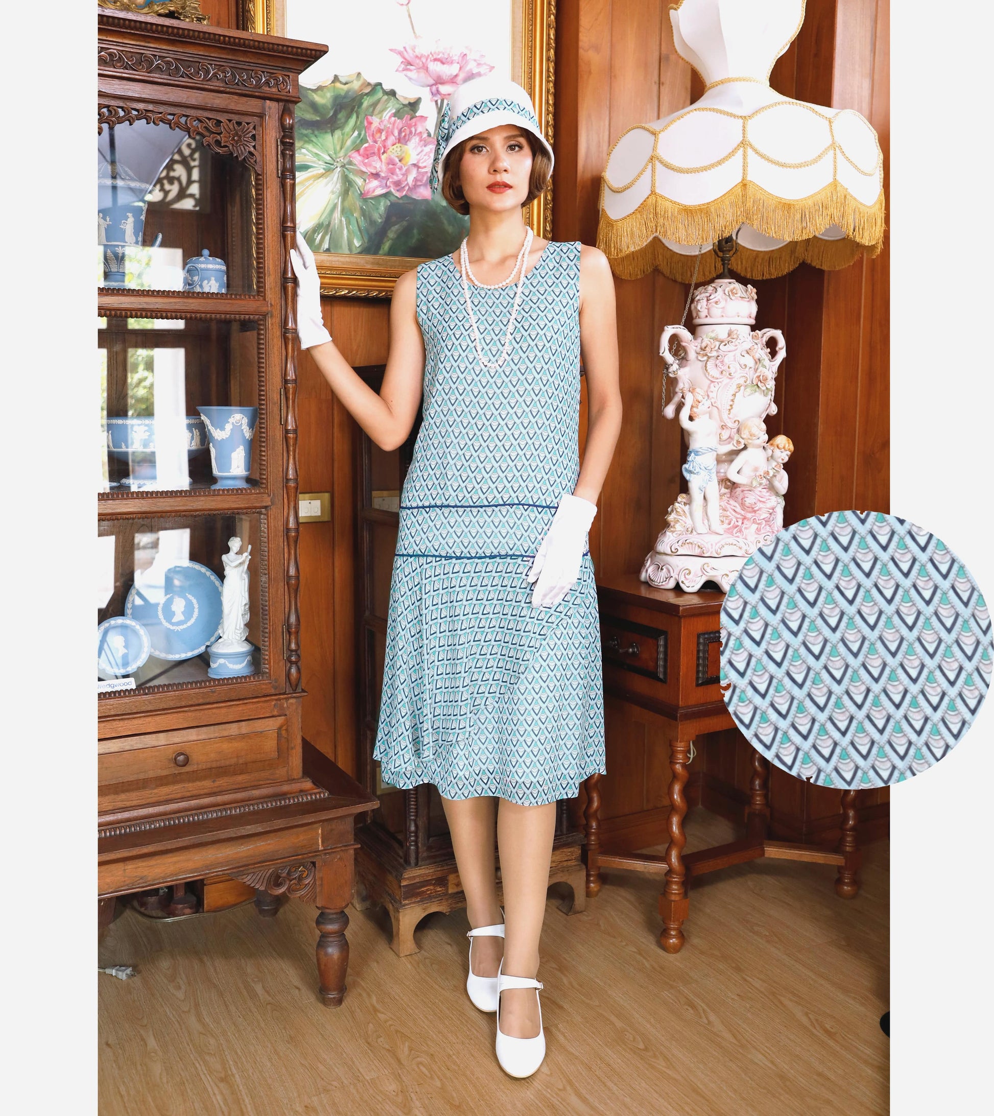 1920s summer dress of printed light blue chiffon with a ruffled skirt detail - a roarin twenties dress