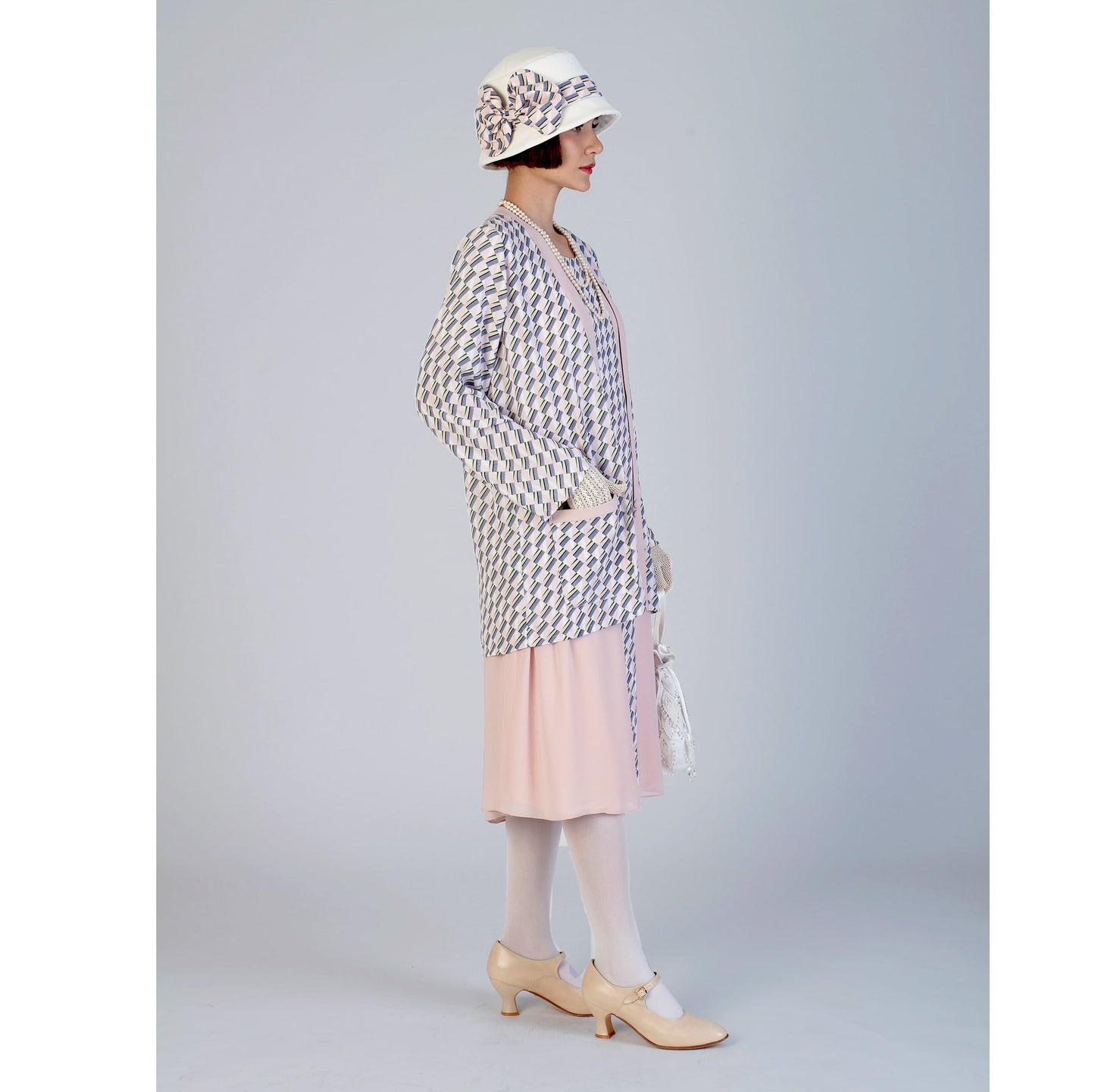 Vintage-inspired 1920s jacket and matching Great Gatsby dress made of printed chiffon with contrast details, great for any roaring twenties event.