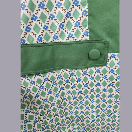 Cotton 1920s day dress in green & white diamond print and green panels