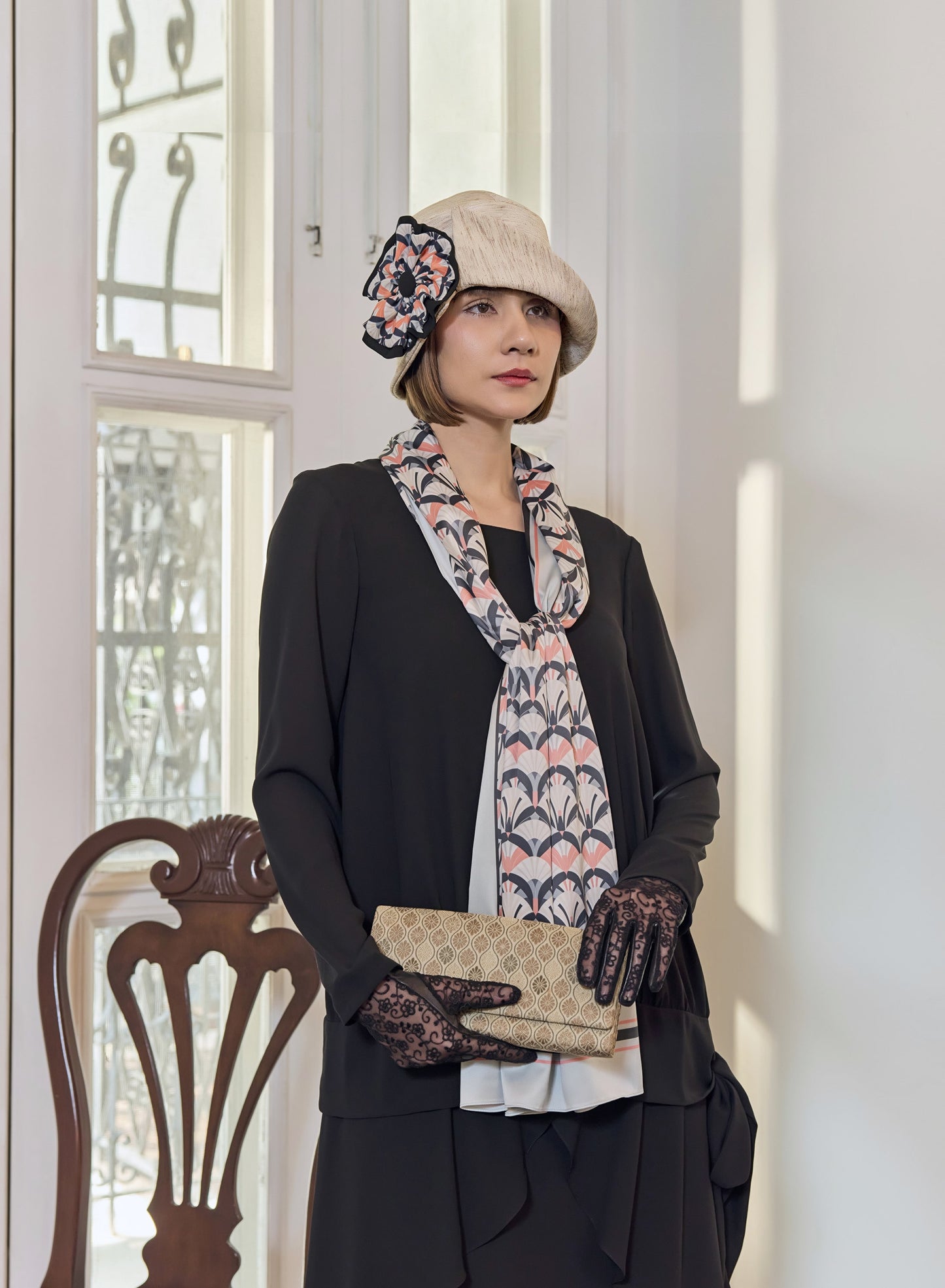 Cream cloche hat with art deco floral hat band - a flapper hat