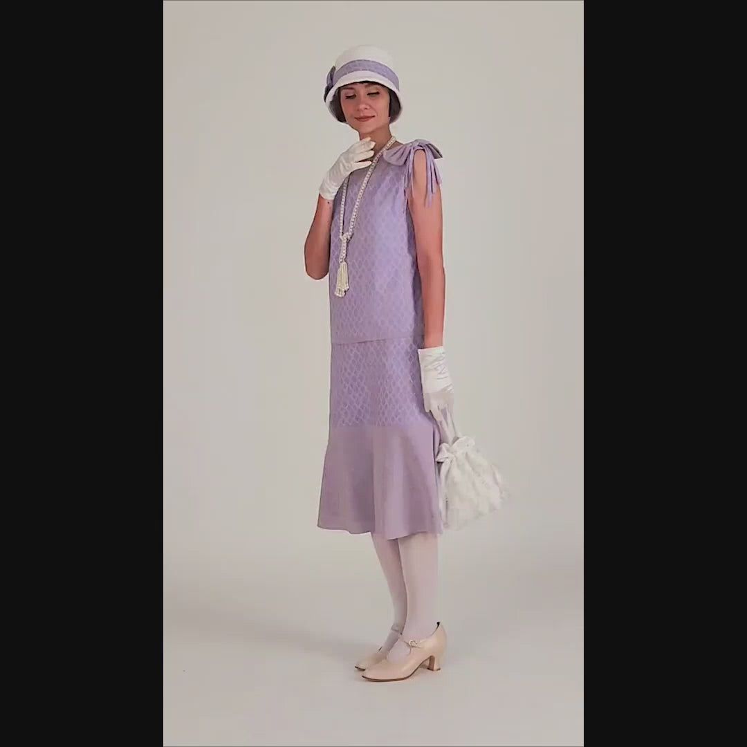 2-piece ensemble of 1920s dress and jacket made of light purple cotton