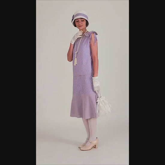 2-piece ensemble of 1920s dress and jacket made of light purple cotton