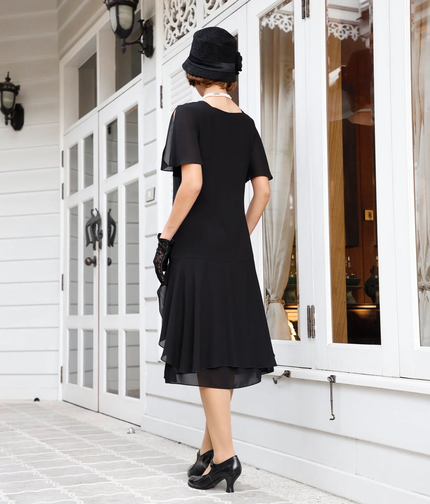 1920s black Great Gatsby dress with sweetheart neckline