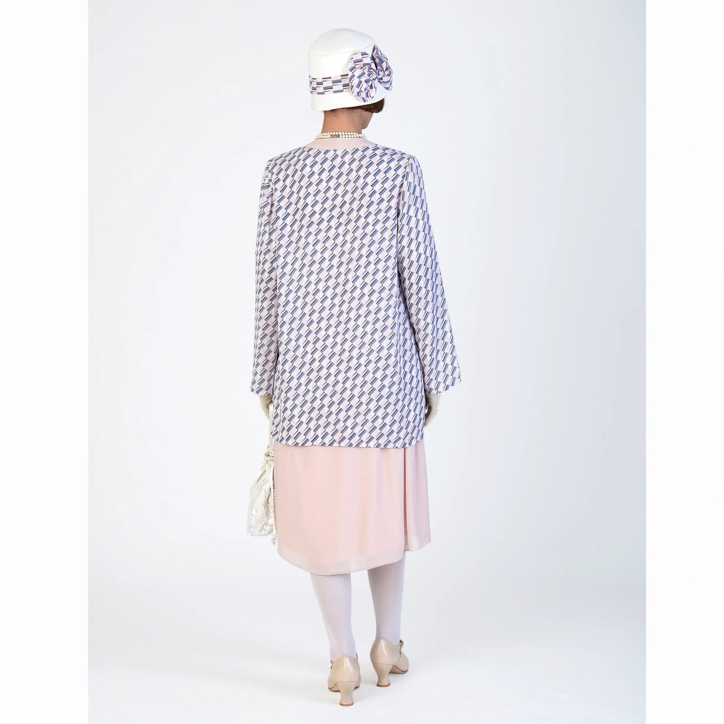 Vintage-inspired chiffon 1920s jacket with nude and print