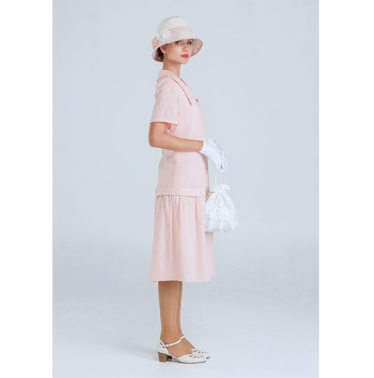 1920s dress of pale peach cotton with large puritan collar and short sleeves