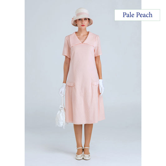 1920s dress of pale peach cotton with puritan collar and short sleeves