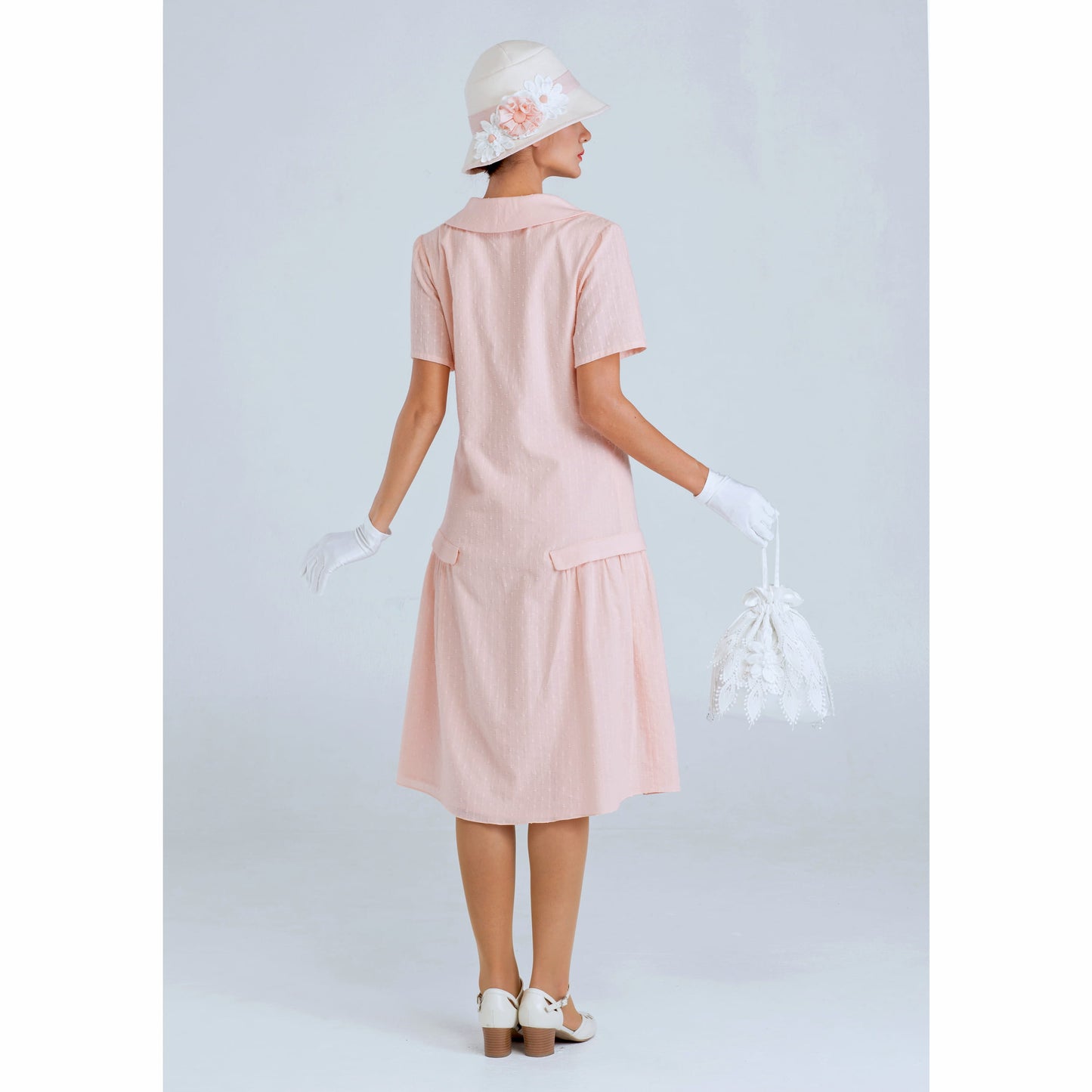 1920s summer dress in pale peach or pale pink colour with puritan collar