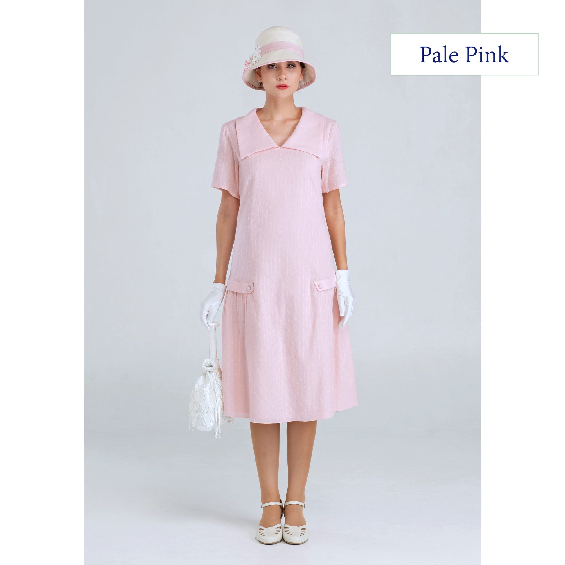 1920s summer dress in pale peach or pale pink colour with puritan collar