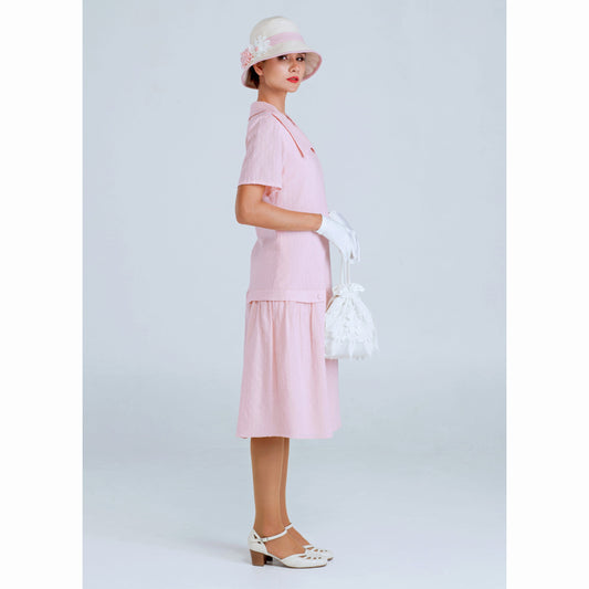 1920s summer dress in pale peach or pale pink colour with puritan collar
