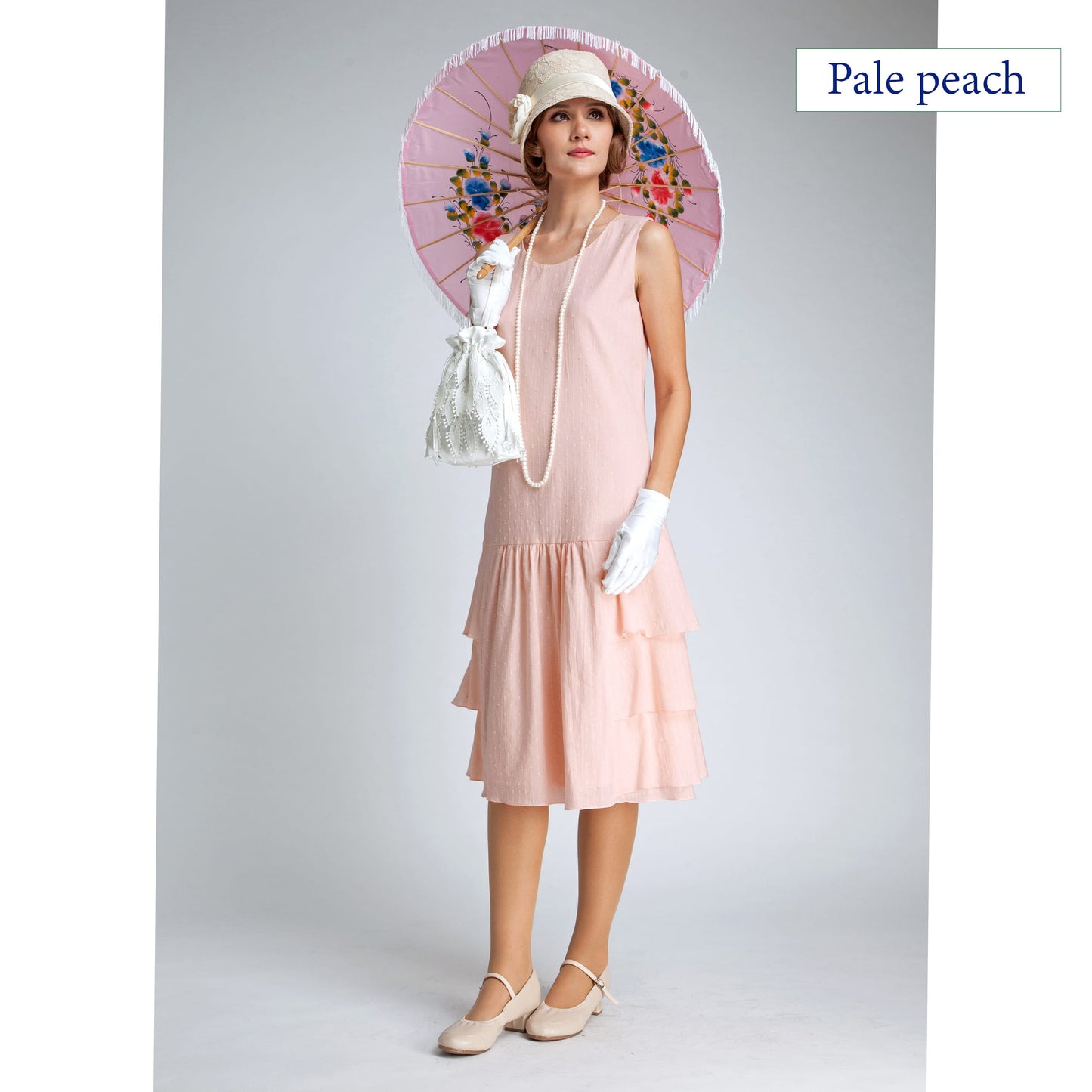1920s dress made of pale peach cotton with tiered skirt