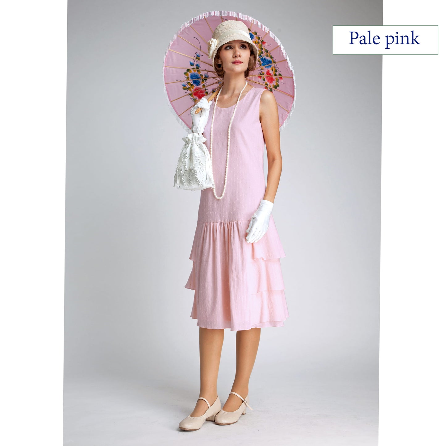 1920s dress made of pale pink cotton with tiered skirt