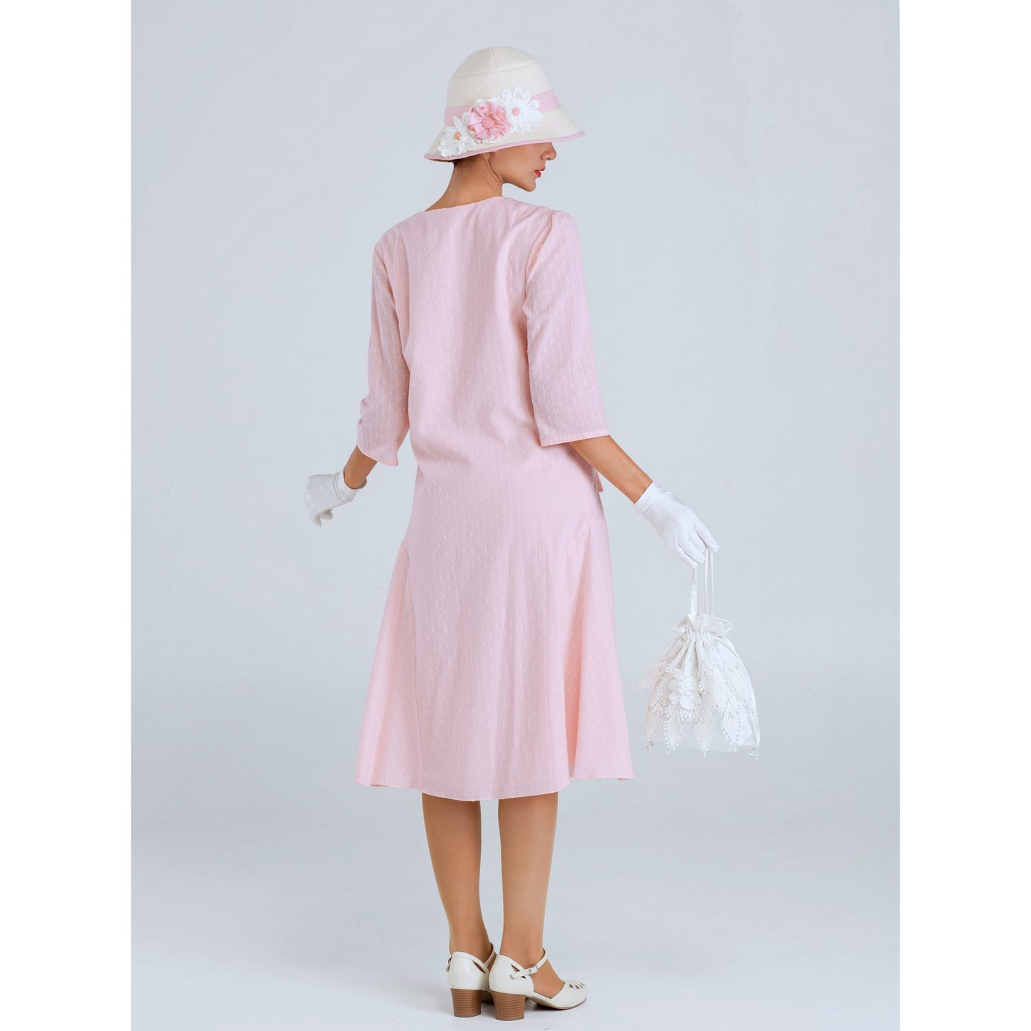 1920s tea party dress of pale peach or pale pink cotton with puritan collar