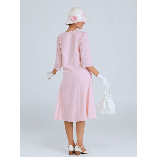 1920s tea party dress of pale peach or pale pink cotton with puritan collar