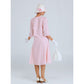 1920s tea party dress of pale peach or pale pink cotton with puritan collar