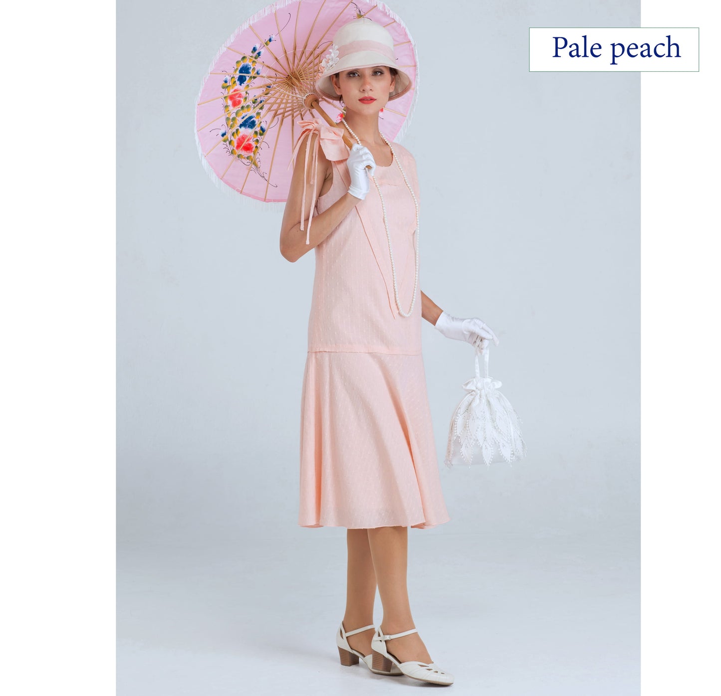 Sleeveless Downton Abbey day dress of pale peach cotton