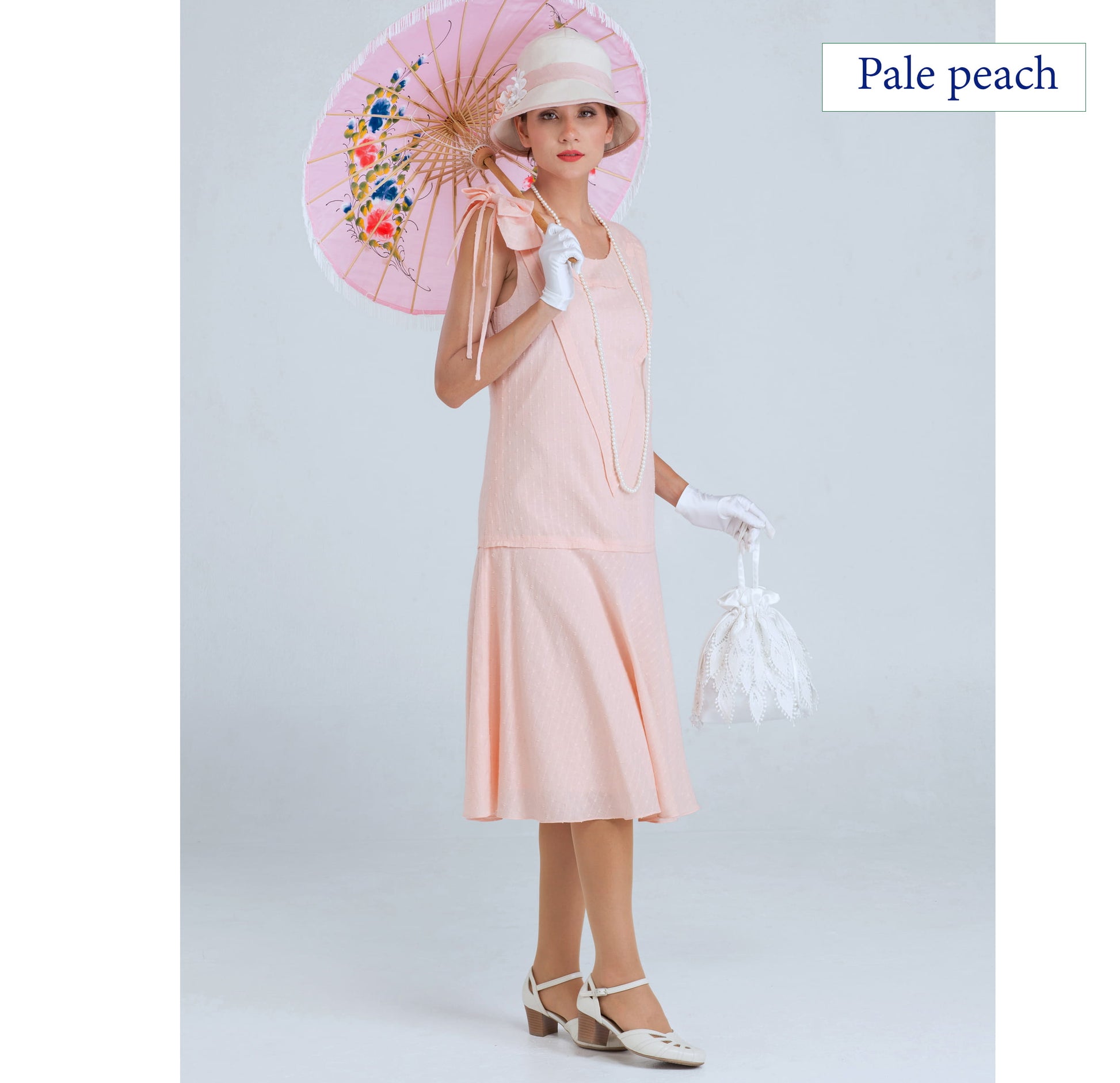 Sleeveless Downton Abbey day dress of pale peach cotton
