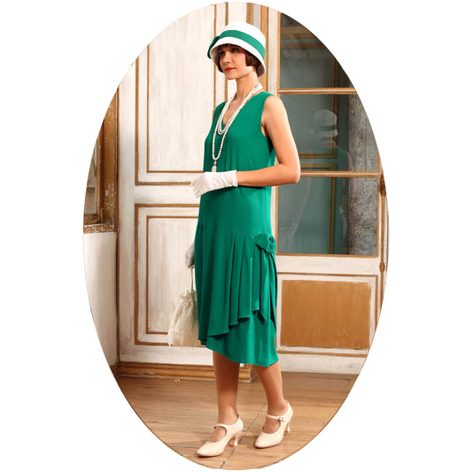 1920s-inspired flapper dress in green with drape and bow - a vintage-inspired Roaring Twenties dress