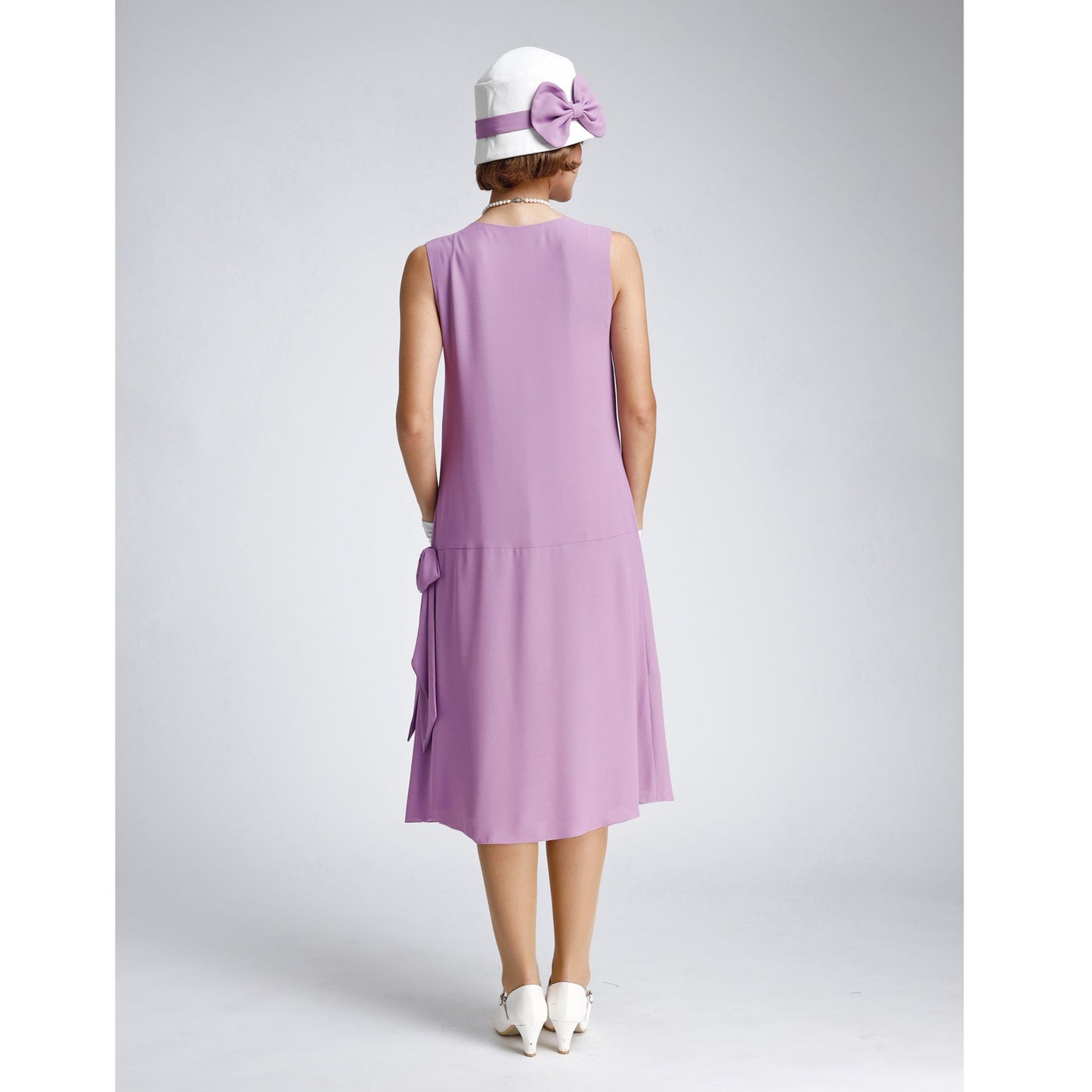 Lavender 1920s-inspired crepe georgette dress with drape and bow