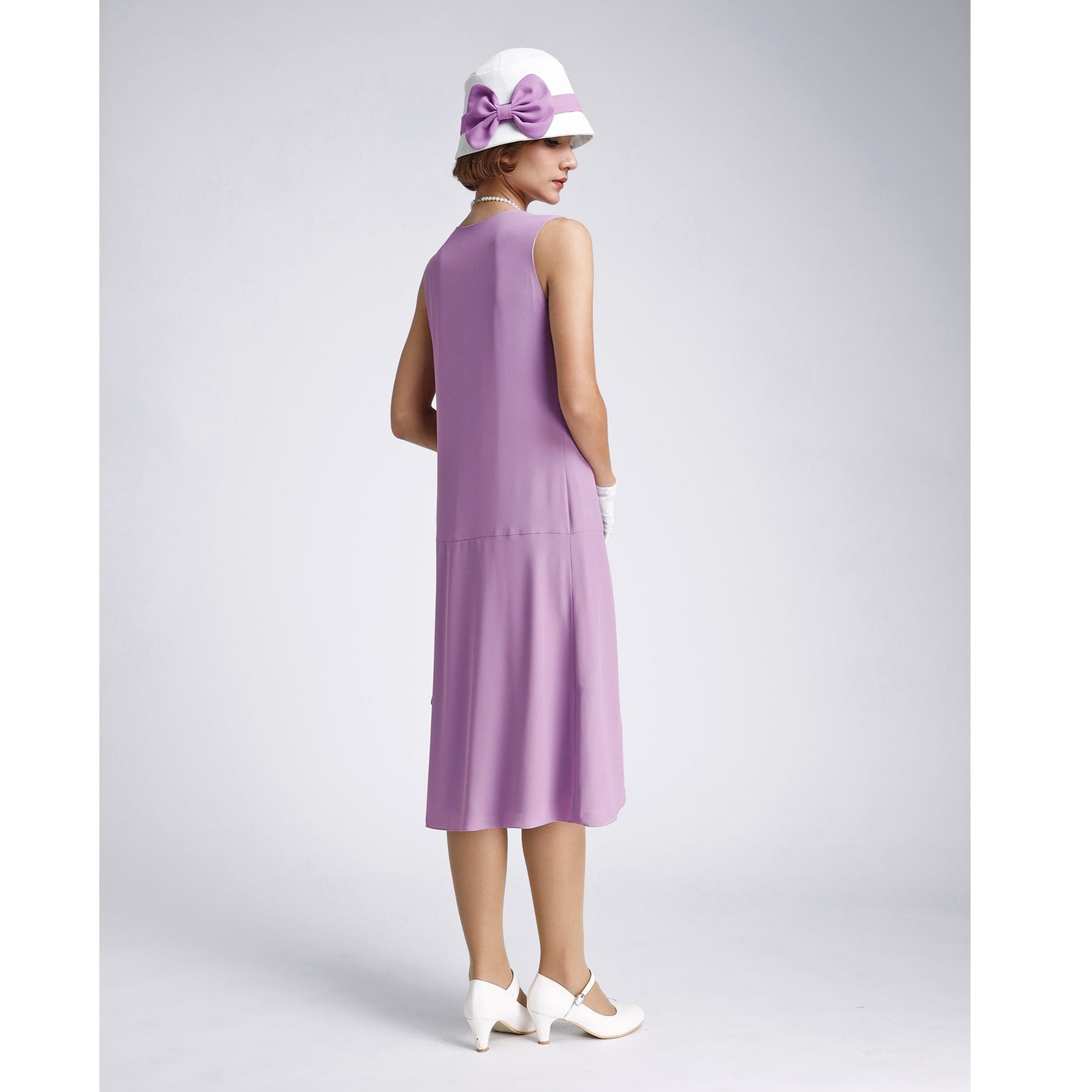 Lavender 1920s-inspired crepe georgette dress with drape and bow. The 1920s dress can be worn, as Great Gatsby dress or Downton Abbey dress.