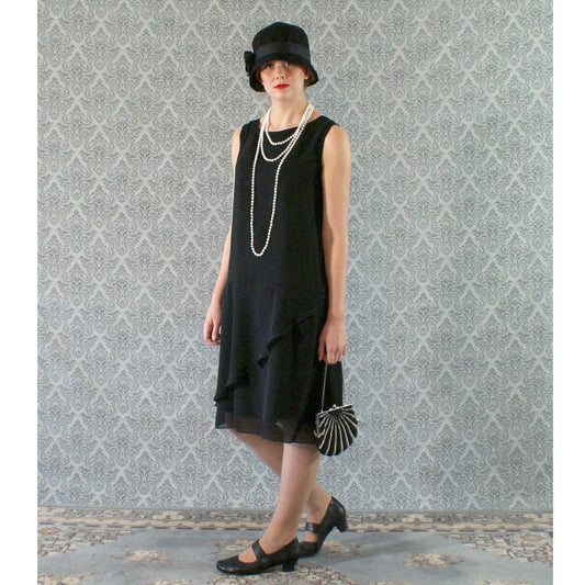 Black chiffon flapper dress with a ruffled skirt detail - a vintage-inspired Roaring Twenties dress