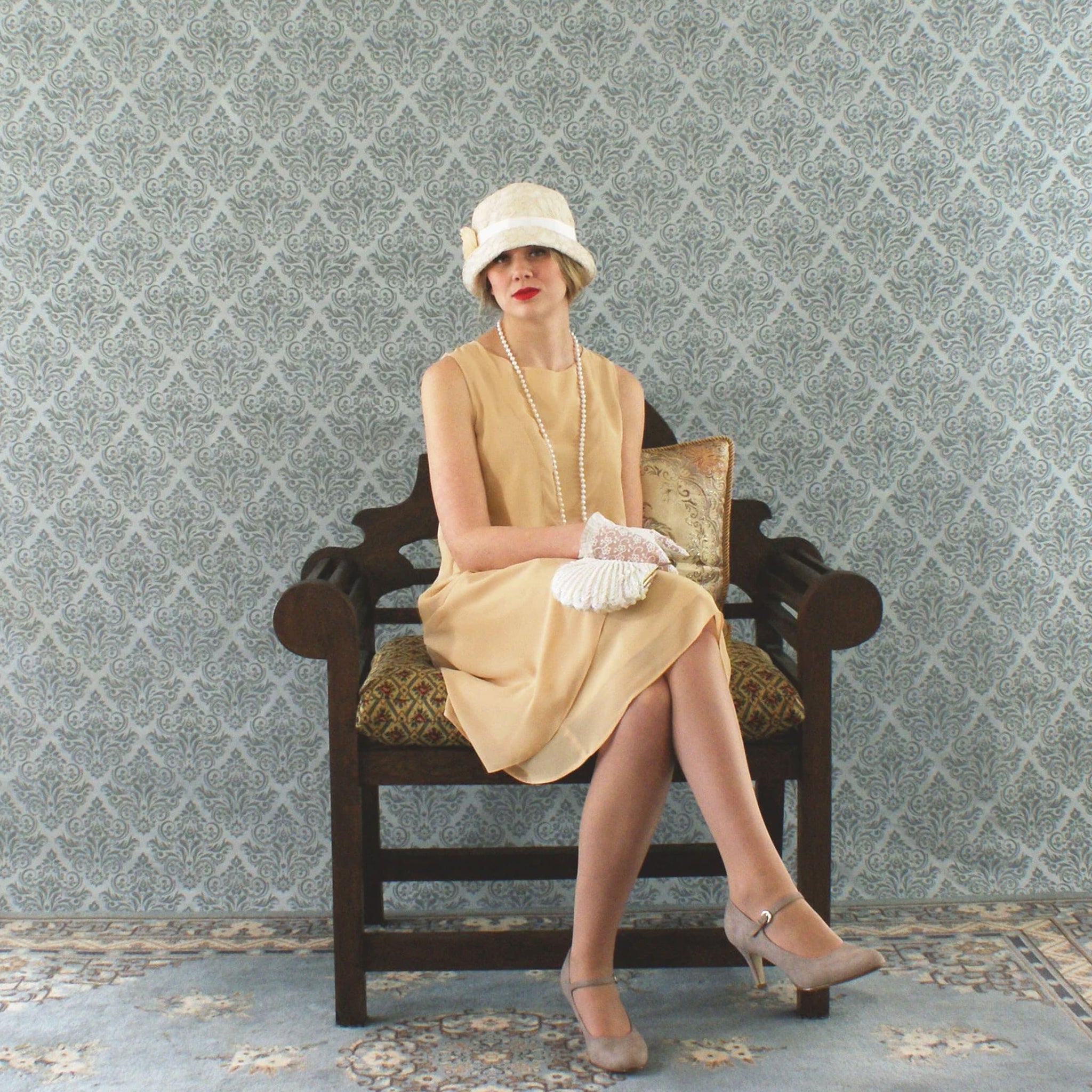 Pale marigold chiffon flapper dress with a ruffled skirt detail ...
