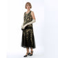 A 1920s formal evening dress, or Gatsby gala dress, in black and gold with zig zag details