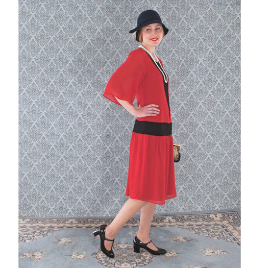 Red and black chiffon 1920s dress or flapper with elbow length sleeves. The roaring 20s dress can be worn as Great Gatsby dress or Charleston dress.