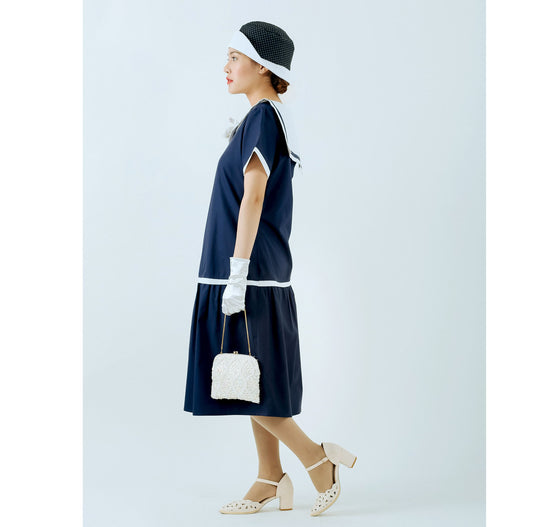 A 1920s sailor dress made of navy and pure white cotton, a marine dress perfect for a vintage summer