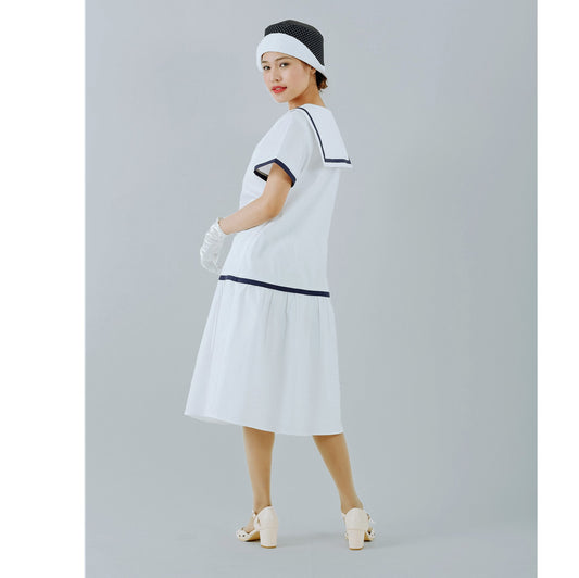 Nautical dress made of pure white and navy-blue cotton poplin. The 1920s dress can be worn as a roaring twenties tea dress or a Great Gatsby party dress.