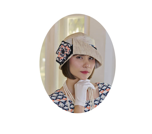Cream cloche hat with art deco floral hat band - a 1920s hat