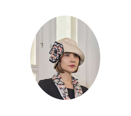 Cream cloche hat with art deco floral hat band - an art deco hat