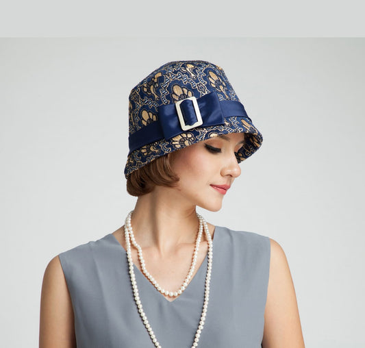 1920s cloche hat with blue and soft gold brocade fabric