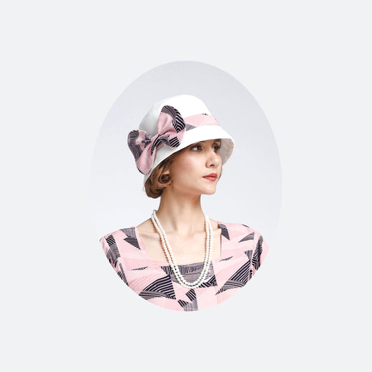 1920s off-white cloche hat with pink and black ribbon - a vintage-inspired Roaring Twenties hat