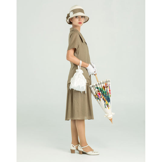 1920s day dress made of quality linen fabric in olive green. The 1920s high tea dress can be worn as a Jazz Age Lawn Party dress or a Downton Abbey dress.