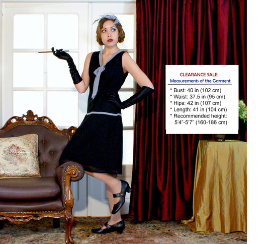 CLEARANCE: A lovely little black flapper dress wth a grey bow