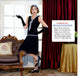 CLEARANCE: A lovely little black flapper dress wth a grey bow