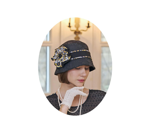 Black cloche hat with lace and art deco fabric bow - a 1920s hat