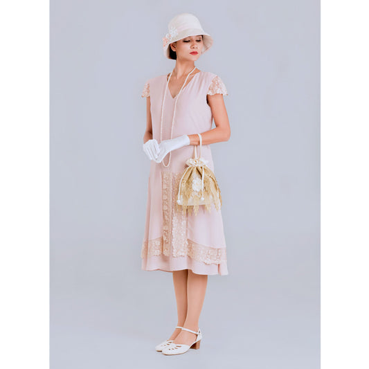 This cotton 1920s cloche with peach trims can be worn, for example, as a flapper hat, Downton Abbey hat or Great Gatsby hat.