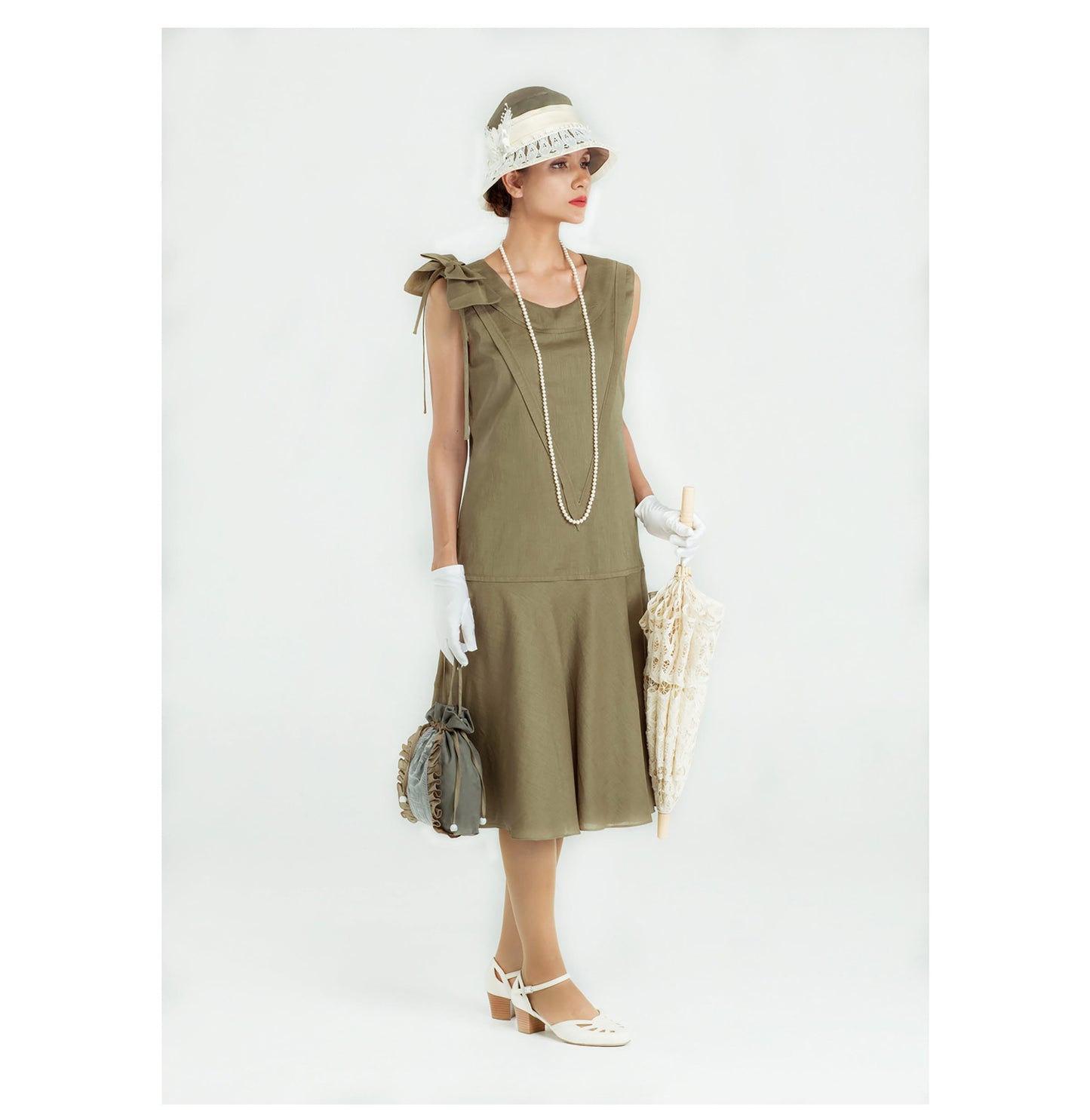Sleeveless 1920s linen dress in olive green with bow on shoulder