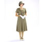 1920s fashion style linen dress in olive green with zigzag detail