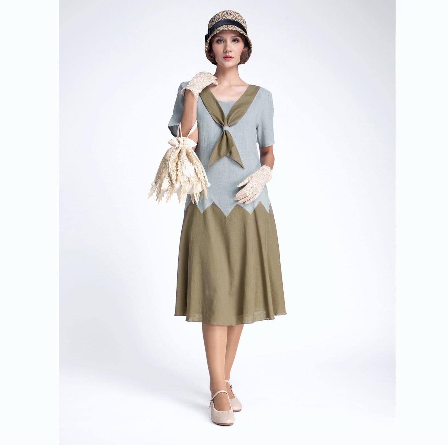 1920s fashion style linen dress in grey/olive green with zigzag detail