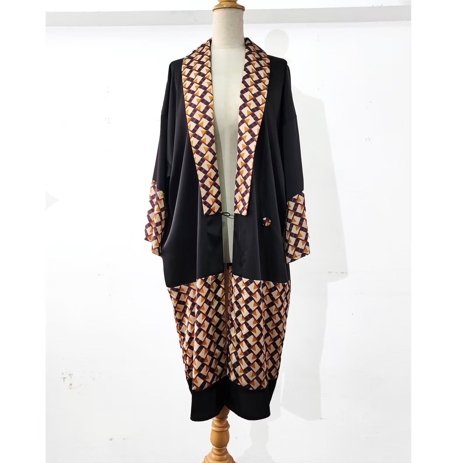 This black satin Kimono robe with brown print can be worn as a 1920s formal jacket or a Great Gatsby coat, among others.