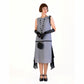 Grey party dress in 1920s style with black details and shoulder bow - a vintage-inspired Roaring Twenties dress