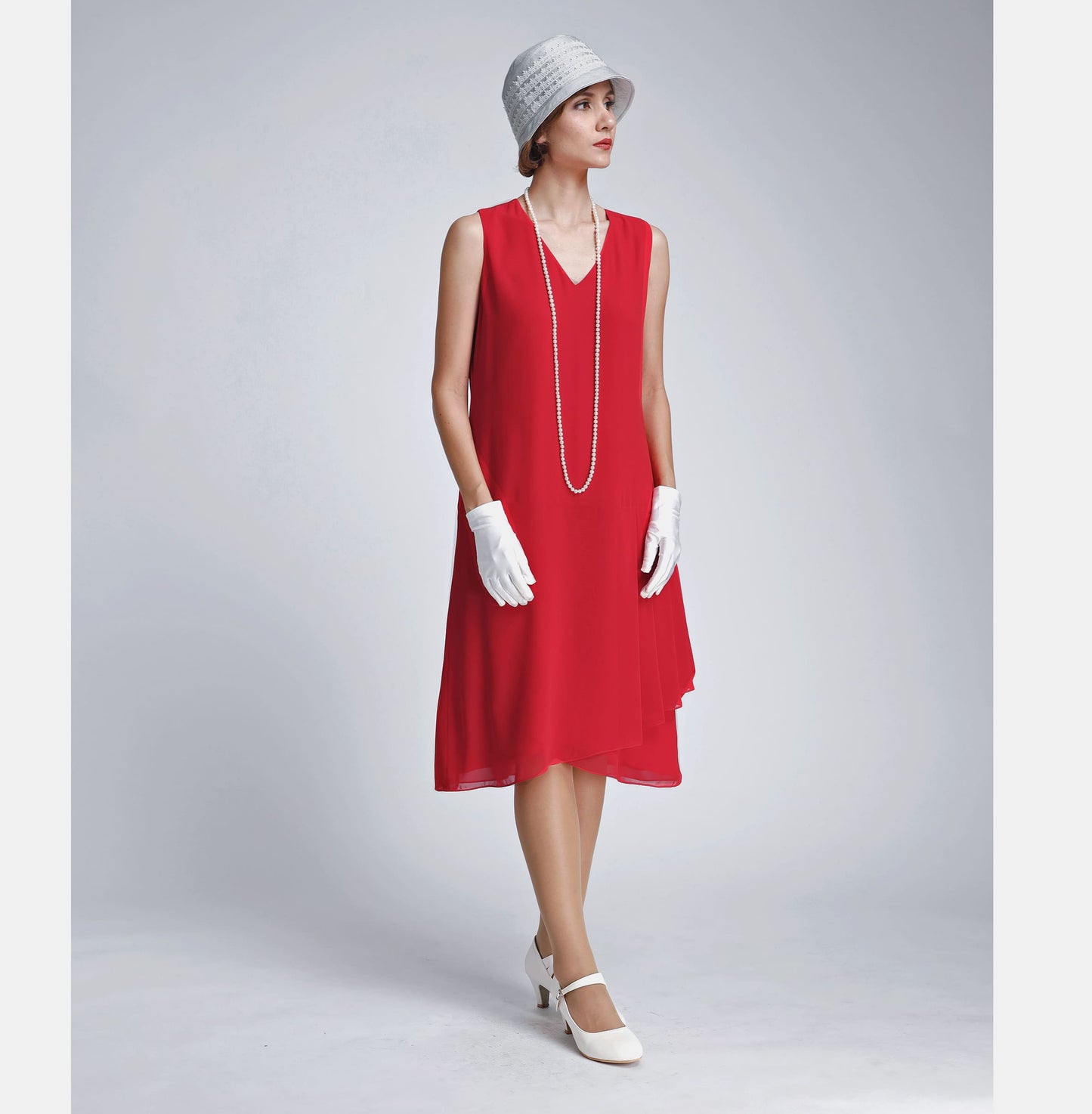 Red chiffon party dress with drape and bow, a vintage-inspired Roaring Twenties dress