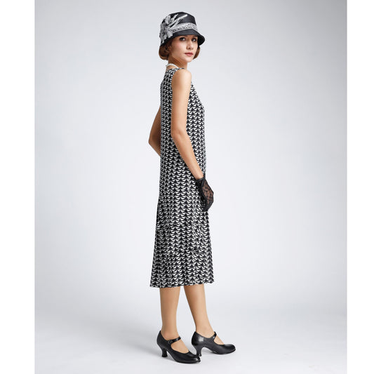 1920s fashion dress made of black and white viscose fabric. The 1920s dress can be worn as a Gatsby dress, 1920s high tea dress or roaring 20s flapper dress.