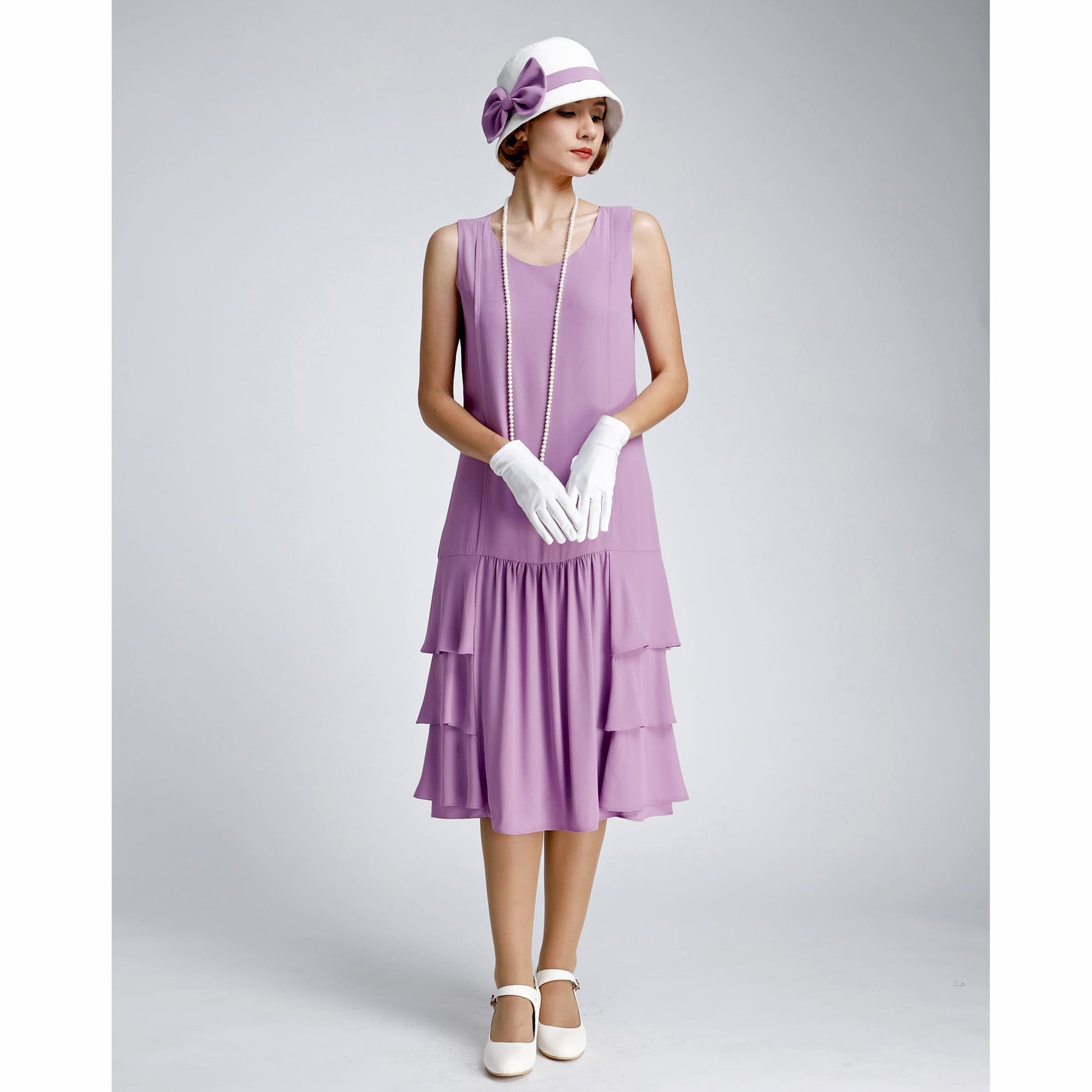 Purple 1920s-inspired dress with tiered skirt Purple 1920s-inspired dress with tiered skirt