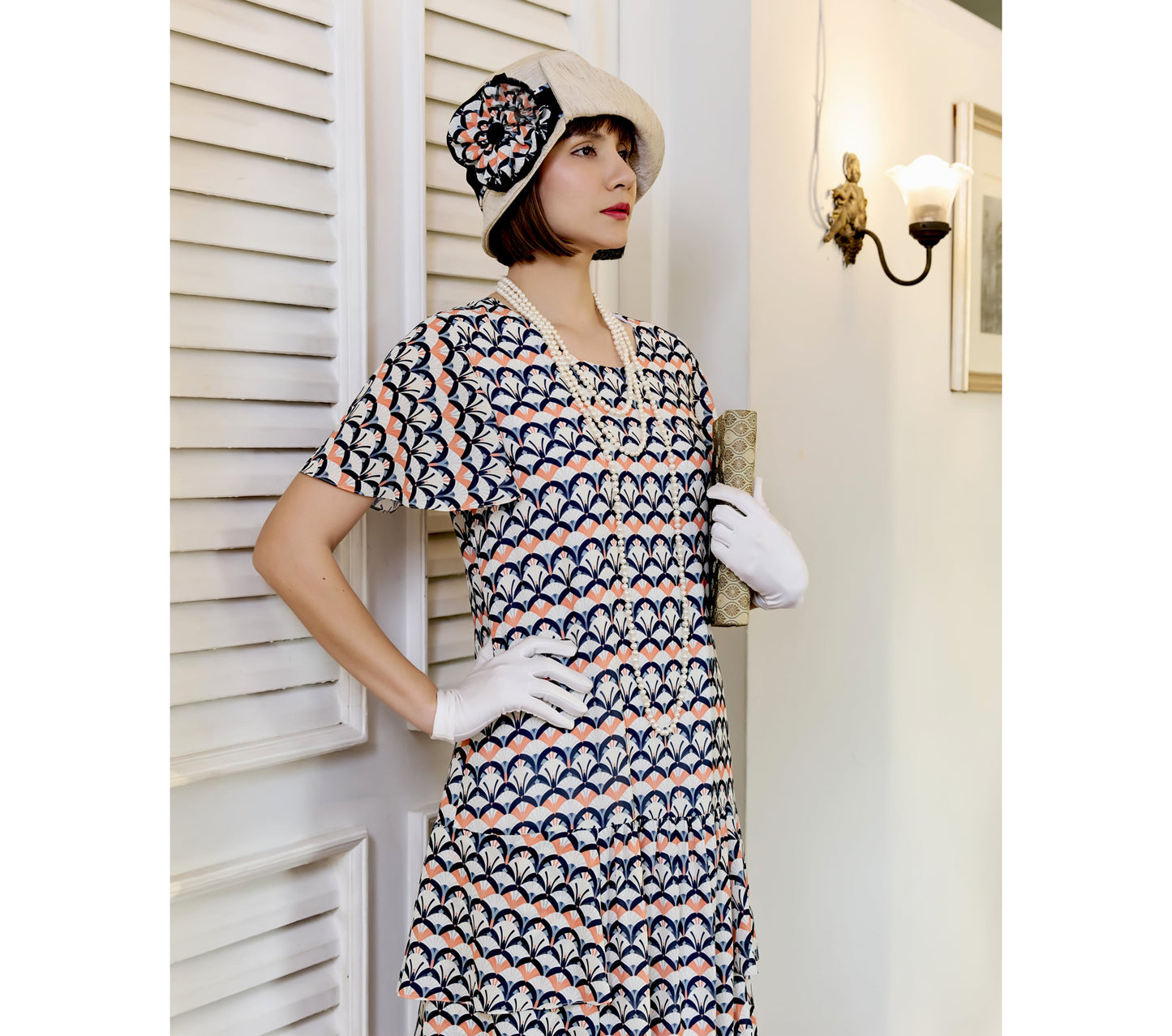 Chiffon flapper day dress in art deco print with tiered skirt